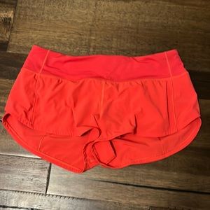 CARNATION RED LULULEMON SPEED UP SHORTS 2.5 INCH
